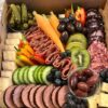 Party Box in traditional style with assorted meats, cheeses and fruit.