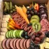 Party Box in traditional style with assorted meats, cheeses and fruit.