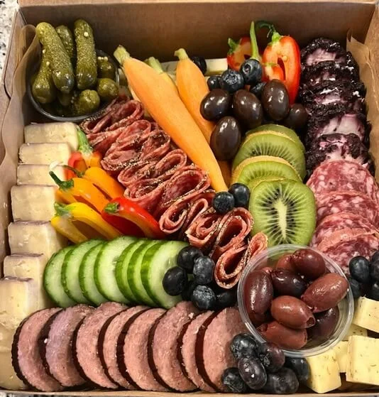 Party Box in traditional style with assorted meats, cheeses and fruit.