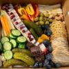 Party Box in traditional style with assorted meats, cheeses and fruit.