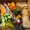 Party Box in traditional style with assorted meats, cheeses and fruit.