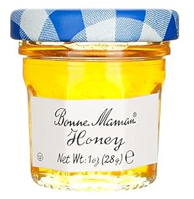 Jar of honey with a blue and white top