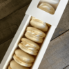 Vanilla macarons in a box